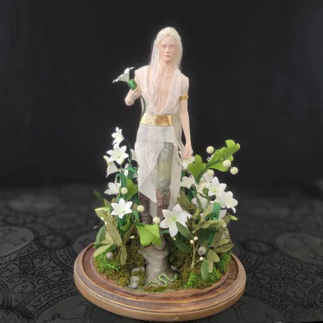 Remenaxice from Sufferborn and Elves Unwelcome as a 3d printed sculpture assembled with organic clothing and hair, and hand painted.